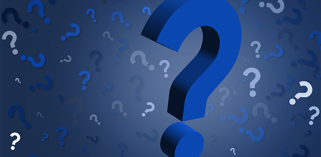 Frågetecken i olika storlekar och färger 